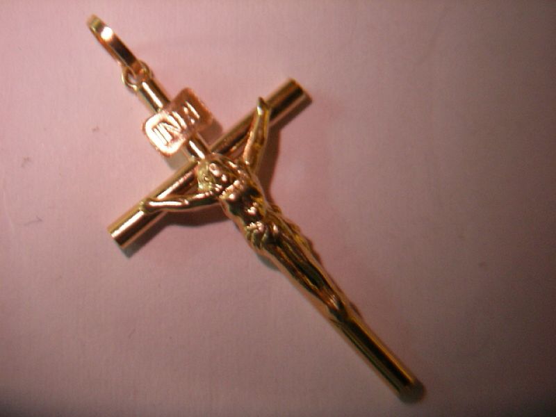 Cruces huecas en oro y plata